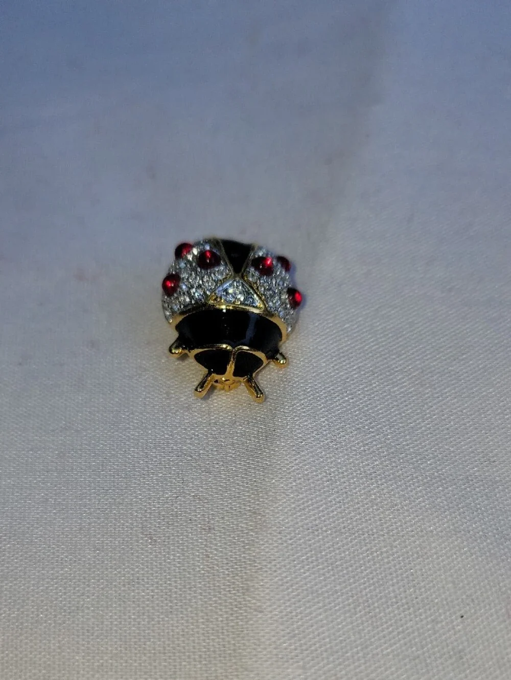 Vintage Joan Rivers Black Enamel and Red Crystal Ladybug Brooch